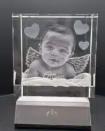 3D crystal photo cube with a baby photo engraved inside, on an LED light base