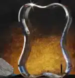 Dog bone shaped 3D crystal on a black base